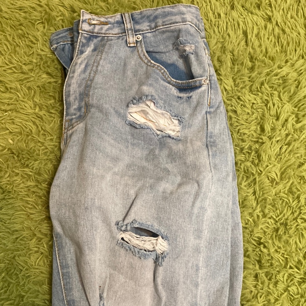 blue ripped mom jeans